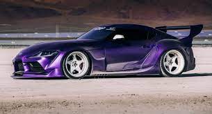 very wide very purple 2020 toyota gr supra is an attention seeker cars luxury car quotes living in car car ride toyota supra toyota supra mk4 modified cars