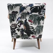 Retro Scandinavian Chair Upholstered In Amazonia Light Fabric By Witch And Watchman Featuring Tropical Palm Leav Cotton Lights Scandinavian Chairs Light Fabric