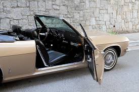 Image result for Sierra Tan 1965 Corvair
