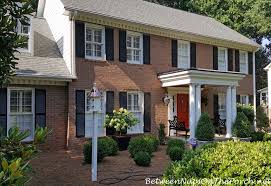 My inspiration photo for my front flower bed. A Front Yard Landscape Update Green Beauty Boxwoods Growing Like Weeds Between Naps On The Porch