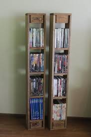 Dvd Shelf Made Of Pallets Shabby Chic Pallet Furniture In 2020 Dvd Shelves Shelves Diy Dvd Storage