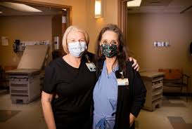 Donna Atherton and Karen Pinkard are nurses who have worked together for  years. The day Karen's heart stopped at work, Donna was there to save her  life.