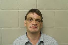 Bartlesville man charged with molesting child with handgun