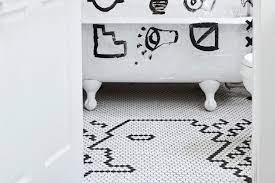 Hi, i recently wallpapered my guest bath and it inspired me to continue. How To Diy A Custom Tile Floor Architectural Digest