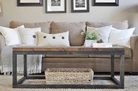 Entirely handcrafted using solid wood and iron and embellished with iron accents, this rustic industrial design coffee table will be a unique addition to your collection. 10 Ways To Build A Beautiful Rustic Coffee Table You Ll Love