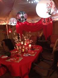 Elegant Chinese New Year Party Decoration Idea Using Red Colored Decorations And Paper Lanterns Chinese New Year Party Chinese Party Chinese Theme Parties