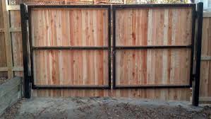 Backside Of Wood Privacy Gate On A Metal Frame Wood Fence Gates Aluminum Fence Gate Fence Gate Design