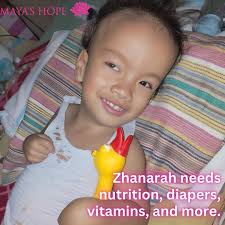 At just 2 years old, Zhanarah is facing tremendous challenges—including  Epilepsy, Global Developmental Delay, Hydrocephalus, and Lissencephaly  Pachygyria—a rare brain disorder. Despite her strength, her family is  struggling to provide the care