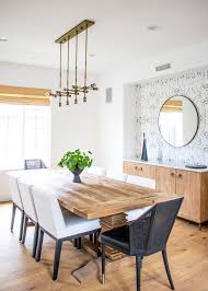 Dining room medium sized contemporary enclosed dining room in london with brown floors, grey walls, dark hardwood flooring and panelled walls. Dining Rooms Archives Becki Owens