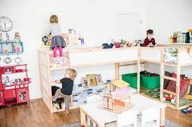 A Sprightly Shared Bedroom For Three Kids Shared Bedroom Ikea Bunk Bed Ikea Kura Bed