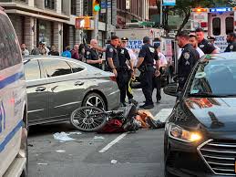 One dead, four injured in Manhattan car crash: sources