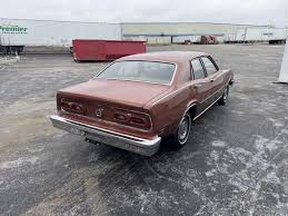 Image result for Dark Red 1976 Mercury