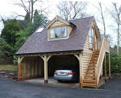 Authenticity, quality, attention to detail and a personal service remain the key reasons for choosing a building from oak designs; A Bespoke Version Of Our Standard Two Bay Garage Oak External Staircase Large Dormer Window Velux Windo Garage Guest House Garage Door Design Timber Garage