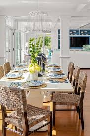 Create the ultimate boho dining space with faux leather woven dining chairs. White Wooden Dining Table With Brown Woven Chairs Cottage Dining Room