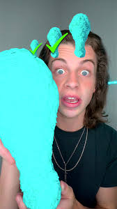 Dude Eating Chicken Wings and Laughing