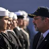 Seaman Chazz Brown, operations specialist, reads the