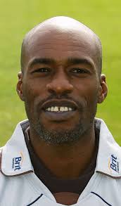 West Indies manager Omar Khan and coach John Dyson watch a practice session 
