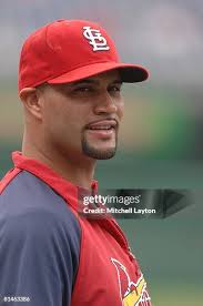 Mark Worrell of the St. Louis Cardinals pitches during a baseball... News  Photo