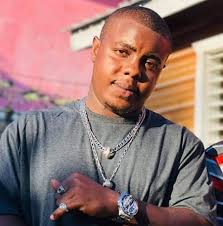 BELIZE CITY MAN CHARGED FOR SATURDAY AFTERNOON MURDER** Police have  arrested and charged twenty-seven-year-old Kareem Nathaniel Beeks for the  murder of twenty-five-year-old Jiovani Augustine. The Butterfly Street  resident is the alleged trigger