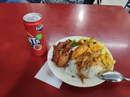 Nasi kandar is a iconic food synonymous with penang island, malaysia. Nasi Kandar With Sotong And Ayam Goreng Bild Von Deen Maju Georgetown Tripadvisor