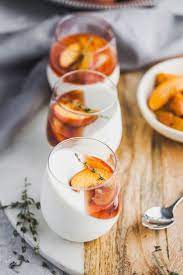 Vanilla Yoghurt Panna Cotta With Balsamic Thyme Roasted Peaches And Nectarines Olive Mango Recipe Food Creamy Desserts Recipes