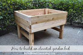 For a simple raised garden bed: How To Build An Elevated Garden Addicted 2 Decorating