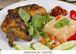1/2 dada ayam fillet 3 batang kemangi 7 siung bawang merah 5 siung bawang putih 4 buah cabe merah keriting sesuai selera cabe rawit. Nasi Goreng Ayam Bakar Spicy Fried Stock Photo Edit Now 241597021