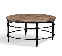 A pottery barn kitchen table that my roommate gave me in exchange for settling up her utility bill debt. Parquet 36 Round Reclaimed Wood Coffee Table Pottery Barn