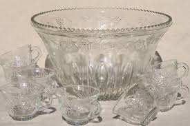 A well designed ice mold, a tasty mix of beverage flavors, maybe some sherbet or something else nice floating punchbowls make beautiful centerpieces. Crystal Clear Pressed Glass Harvest Grapes Pattern Punch Bowl Cups Set Vintage Wedding Glassware Vintage Punch Bowl Set Punch Bowl Cups Wedding Glassware