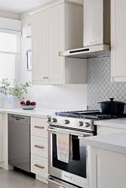 Stainless Steel Kitchenaid Appliances In Stunning White Ikea Kitchen With Brass Accents Kitchen Aid Appliances White Ikea Kitchen Ikea Kitchen