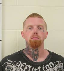 Tattoos help identify fugitive