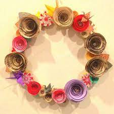 Paper Crafts Charming Ideas For Wall Decor With Colorful Flowers From Recycled Paper Crafts Recyc Paper Flower Wreaths Handmade Decorations Paper Decorations