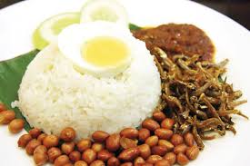 Divide the rice and pack it on top. Spicing Up Malaysia S Beloved Nasi Lemak Life Culture The Business Times