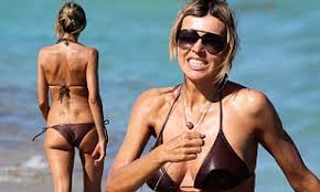 Rita rusic showes off stunning beach bod. Life S Literally A Beach For Film Producer Rita Rusic As She Continues To Lives La Dolce Vita Daily Mail Online