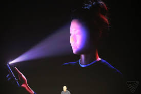 I'm not sure if it was the first, but it was certainly pretty early for the technology. The Five Biggest Questions About Apple S New Facial Recognition System The Verge
