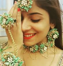 Pastel Green And Gold Colour Floral Choker With Handcuff Earrings And Mangtika Co Wedding Flower Jewelry Flower Jewellery For Mehndi Flower Jewellery For Haldi