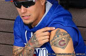 Colorful sports tattoos on both sleeve. Cubs Player Gets Tattoo Of Wrong World Series Logo Sportslogos Net News