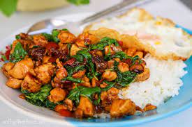 This lunch meal is a bit spicy for some people but it is it is minced pork stirfried with chilli and basil. Authentic Thai Basil Chicken With White Rice Fried Egg Pad Kra Pao Gai 2 Guys 1 Cook