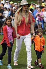 Tiger woods stands with his children sam and charlie after the final round of the quicken loans national at congressional country club on june 26 Tiger Woods Kids Are Growing Up Like Whaaat Tiger Woods Children Tiger Woods Tiger Woods Girlfriend