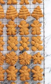 Gingerbread Spritz Cookies Are Buttery And Spiced With Classic Gingerbread Flavors In This Easily Shaped V Spritz Cookies Spritz Cookie Recipe Spritzer Cookies