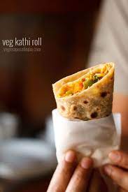 Veg Kathi Rolls Recipe With Step By Step Photos Delicious Wraps Or Rolls Stuffed With A Spiced Mix Veg Stuffing These Mix Recipes Indian Snack Recipes Food