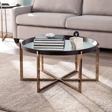 Moswick Round Cocktail Table With Mirrored Top Black Champagne Aiden Lane In 2020 Coffee Table Round Cocktail Tables Circular Coffee Table