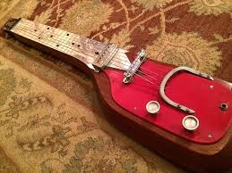 The one mentioned here is not a ready to use guitar but a diy slide guitar kit. Vintage Homemade Bass Lap Steel The Legacy Of Our Instruments The How To Repository For The Cigar Box Guitar Movement