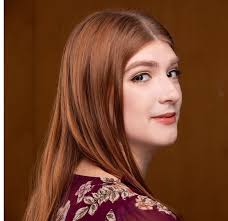 Britta Peterson is a Minnesota native and stay-at-home mom, with experience  in marketing and graphic design. While attending Brigham Young University,  she performed with the university choirs. She has sung in many