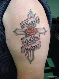 Flower tattoos like sunflower tattoos and lotus flower tattoos are popular but there is more! 39 Memorial Cross Tattoos Ideas