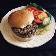 Lay each patty on the bottom bun, followed by pickle, lettuce, and tomato. Natasha S Chicken Burgers Recipe Allrecipes