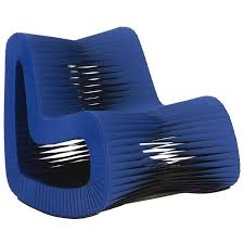 Each piece utilizes cleverly colorful seat belt strappings, which is how the collection got its name. Phillips Collection Seat Belt Rocking Chair Blue Black Unlimited Furniture