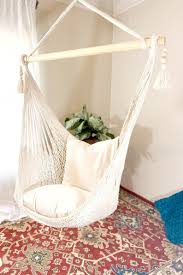 hammock chair macrame hammock macrame swing chair indoor etsy in 2021 indoor swing chair boho chair swinging chair