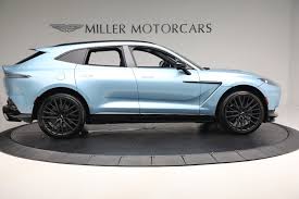 Image result for Concours Blue 2024 Aston Martin