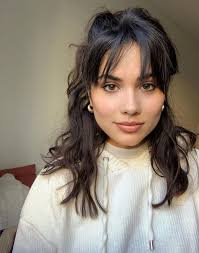 Keeping them slightly longer on the sides also helps the ringlets blend more seamlessly into the rest of your spirals. 50 Best Hairstyles With Bangs For 2021